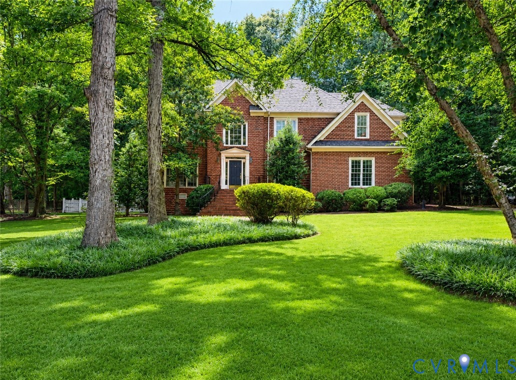 4220 Uppingham Road Richmond, VA 23235 - Photo 1 of 1 Brick exterior featuring gabled dormers, white tri