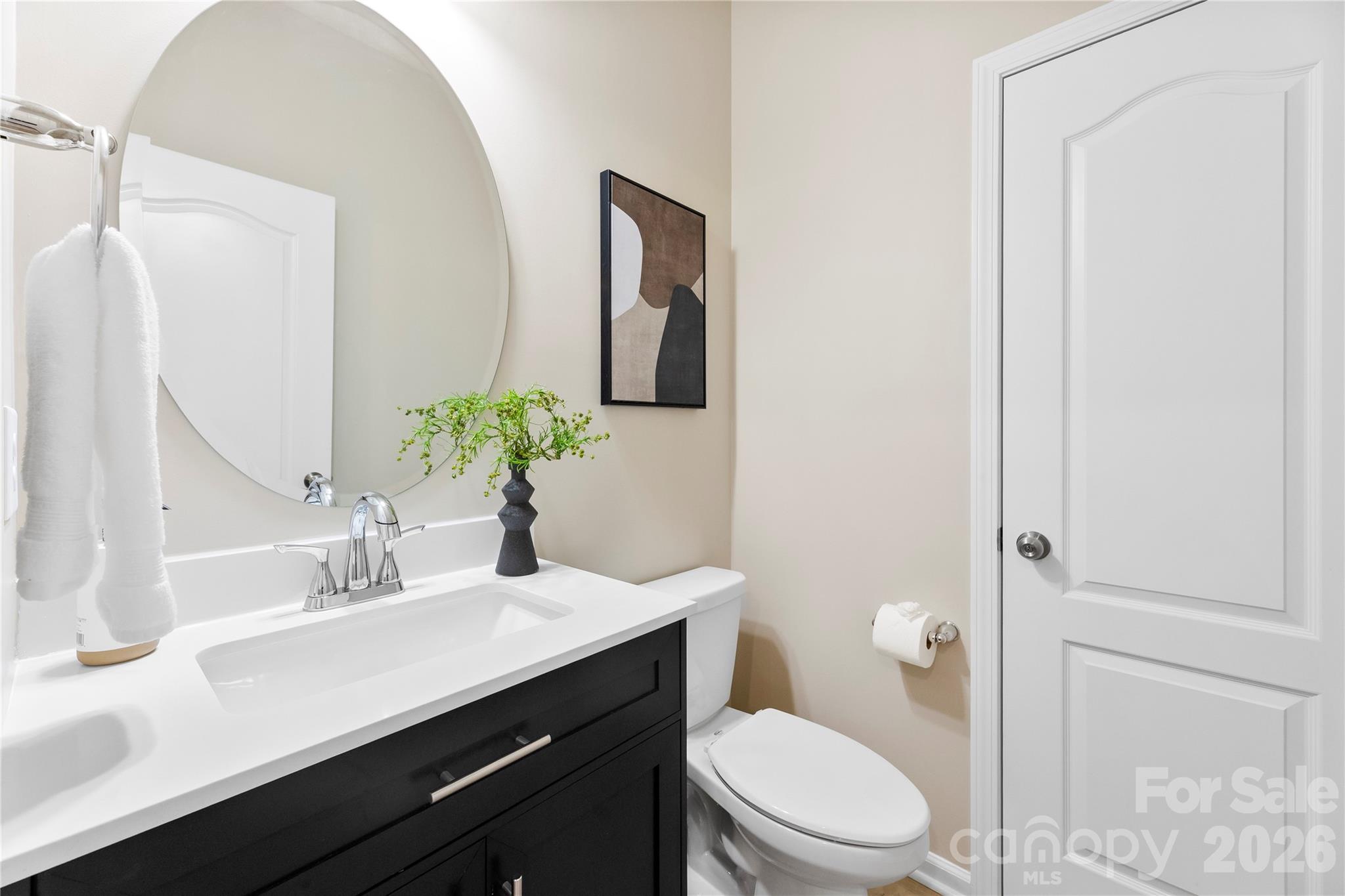 834 Spelman Drive Fort Mill, SC 29707 - Photo 13 of 48 a bathroom with a sink a toilet and mirror