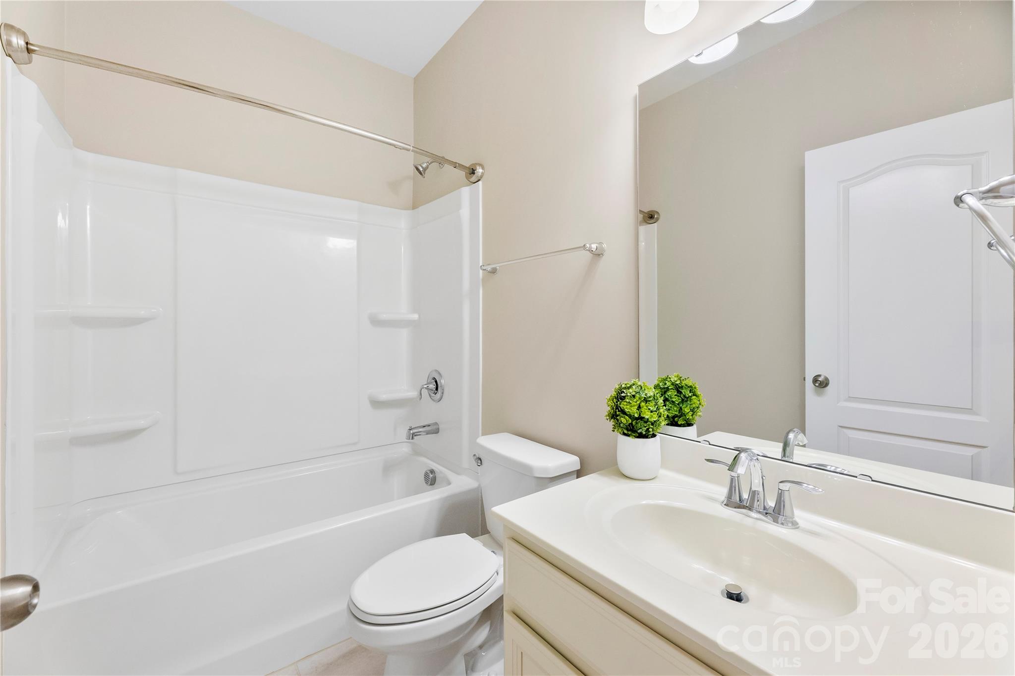 834 Spelman Drive Fort Mill, SC 29707 - Photo 16 of 48 a bathroom with a sink toilet tub and shower