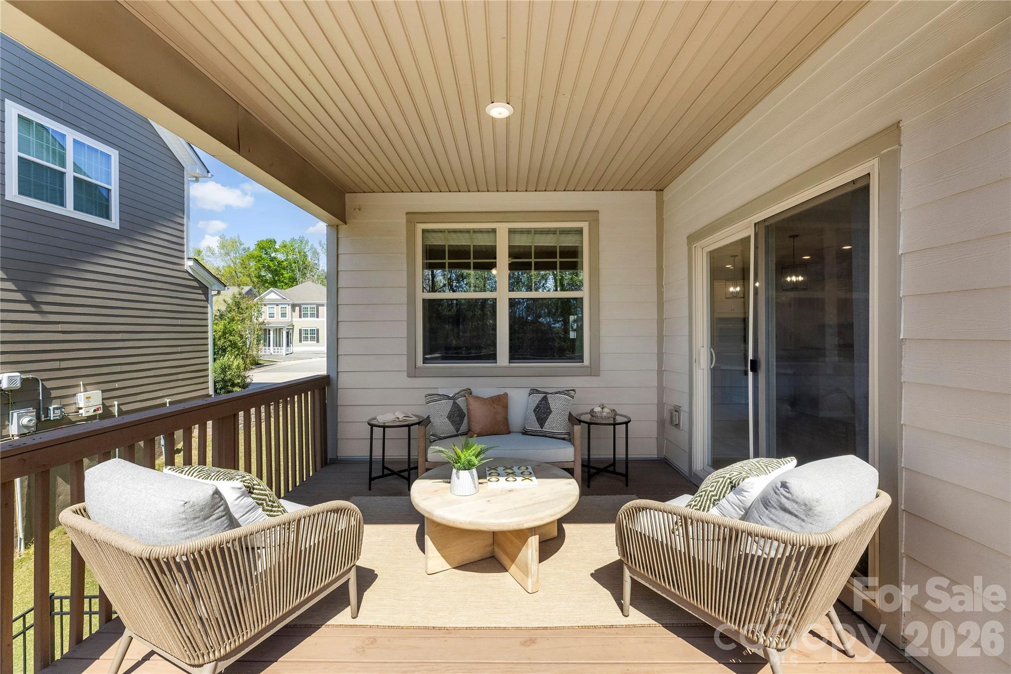 834 Spelman Drive Fort Mill, SC 29707 - Photo 18 of 48 a outdoor living space with furniture and a potted plant