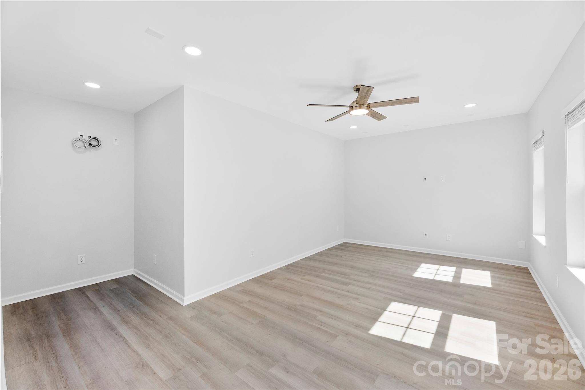 834 Spelman Drive Fort Mill, SC 29707 - Photo 34 of 48 wooden floor in an empty room with a window