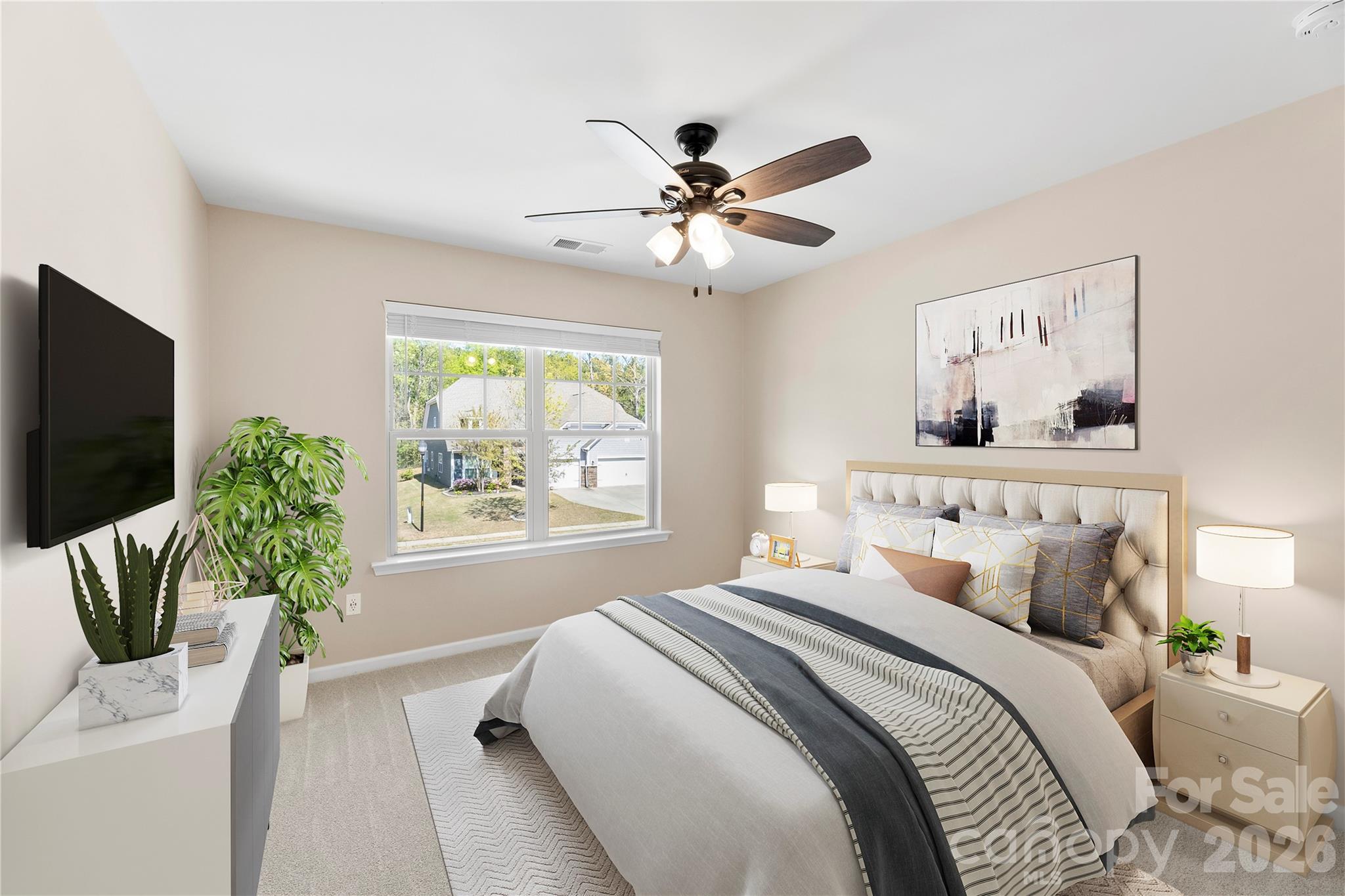 834 Spelman Drive Fort Mill, SC 29707 - Photo 36 of 48 a bedroom with a large bed and a window