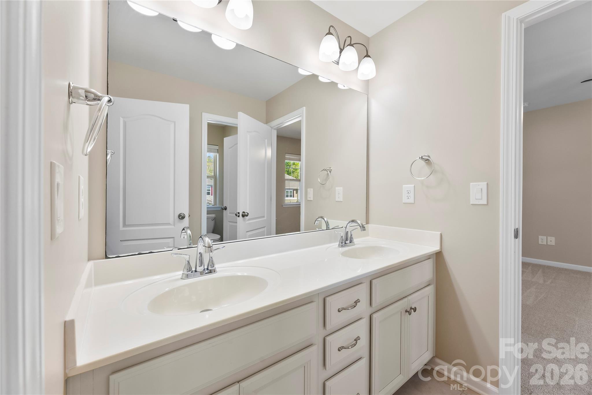 834 Spelman Drive Fort Mill, SC 29707 - Photo 39 of 48 a bathroom with a sink double vanity and a mirror