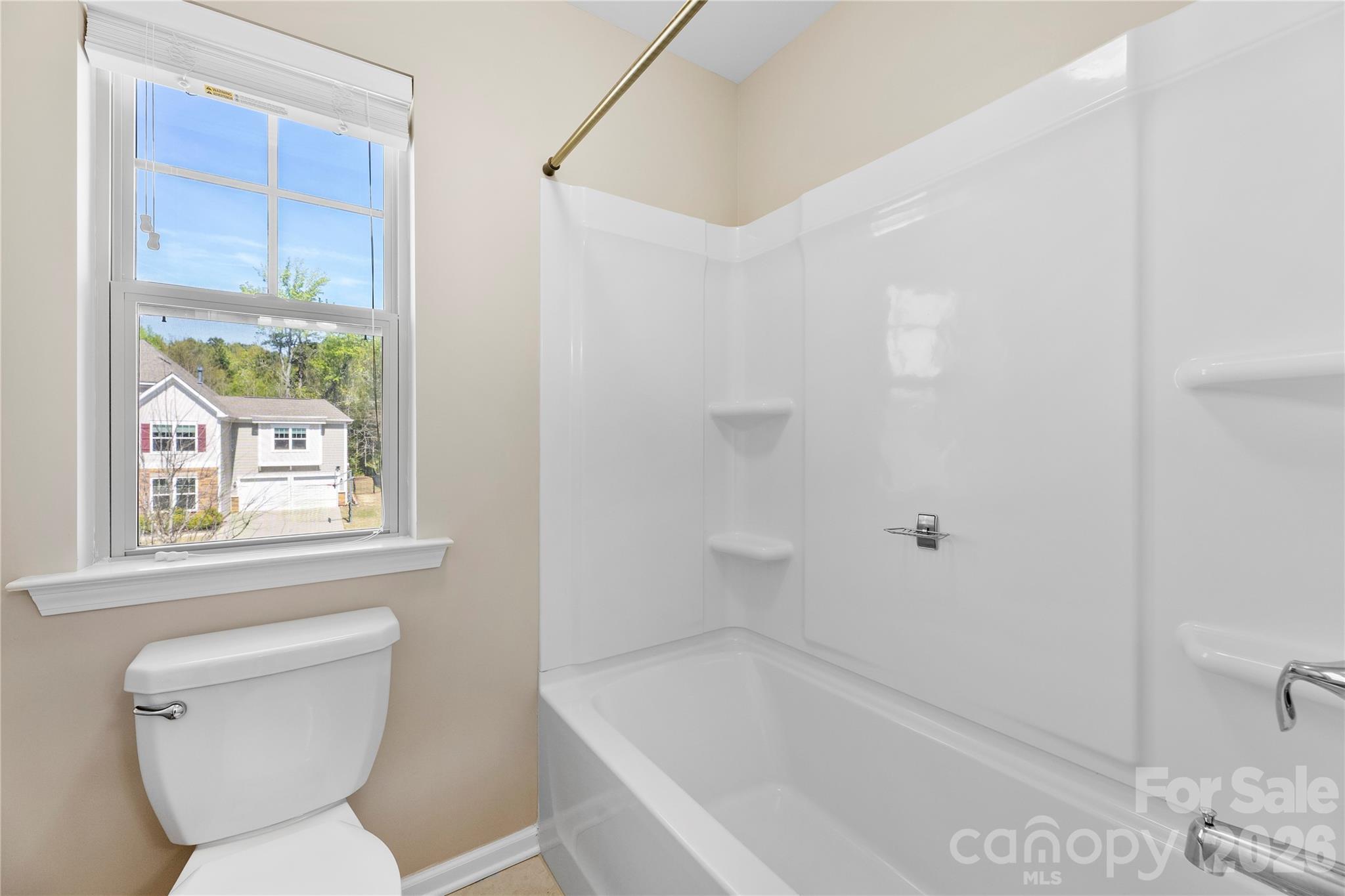 834 Spelman Drive Fort Mill, SC 29707 - Photo 41 of 48 a bathroom with a toilet sink and tub