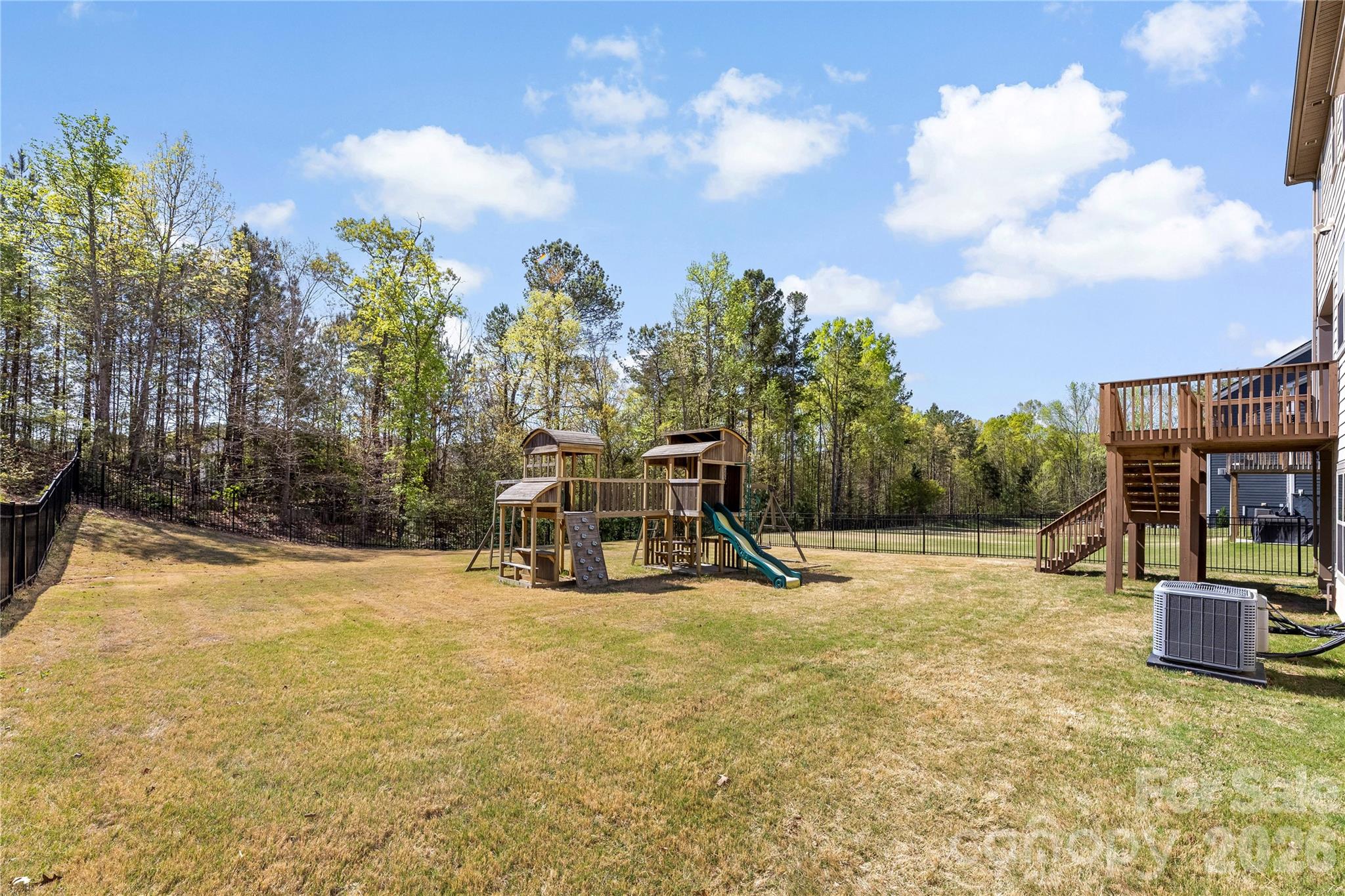834 Spelman Drive Fort Mill, SC 29707 - Photo 45 of 48 a view of a playground with basketball court