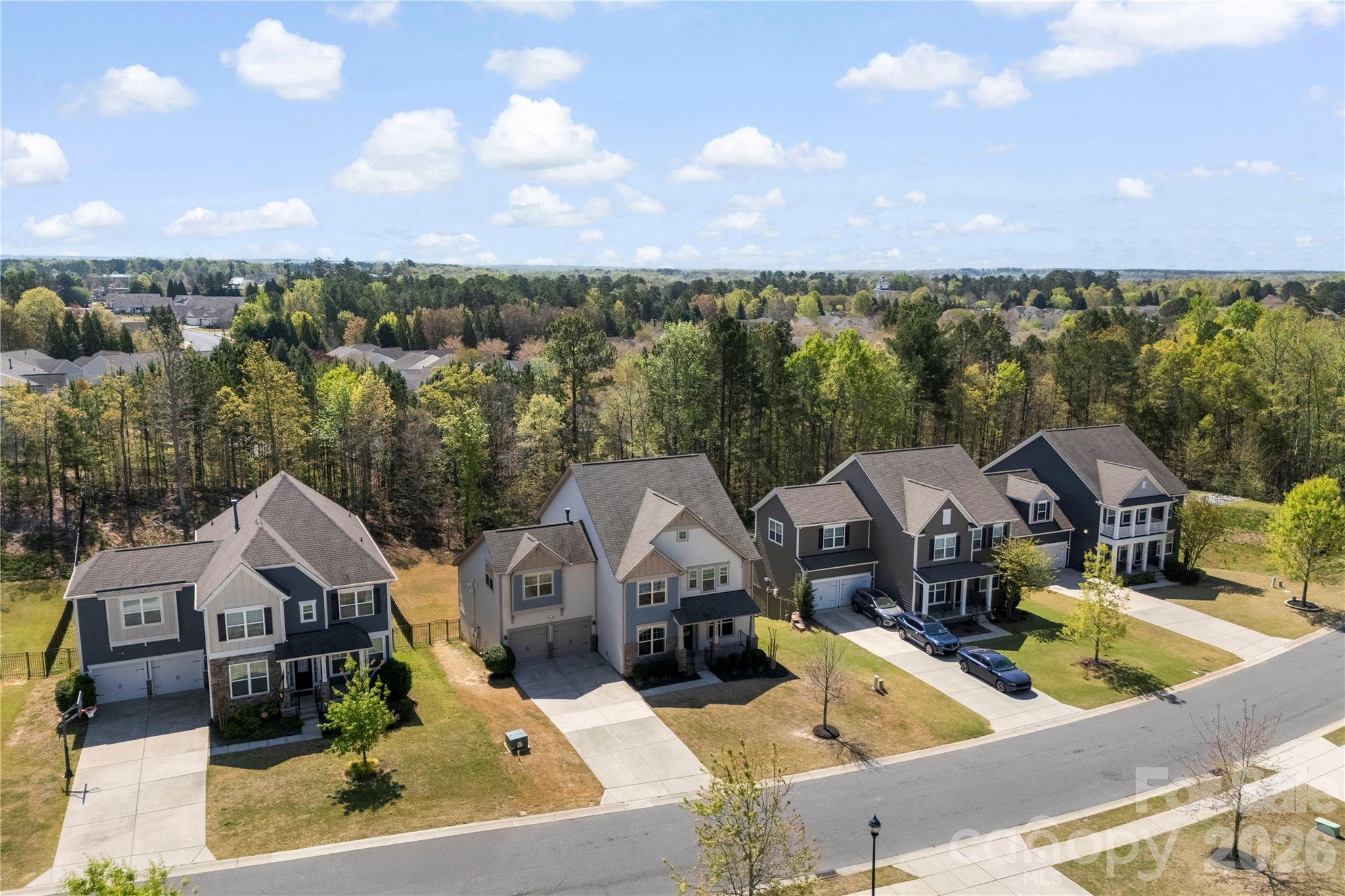 834 Spelman Drive Fort Mill, SC 29707 - Photo 47 of 48 an aerial view of a house with swimming pool and mountains