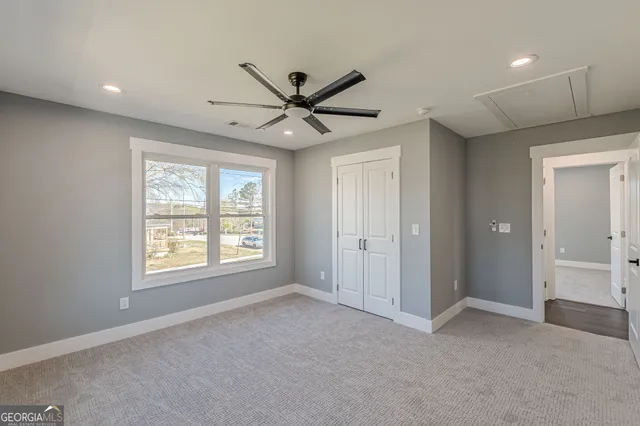 an empty room with windows