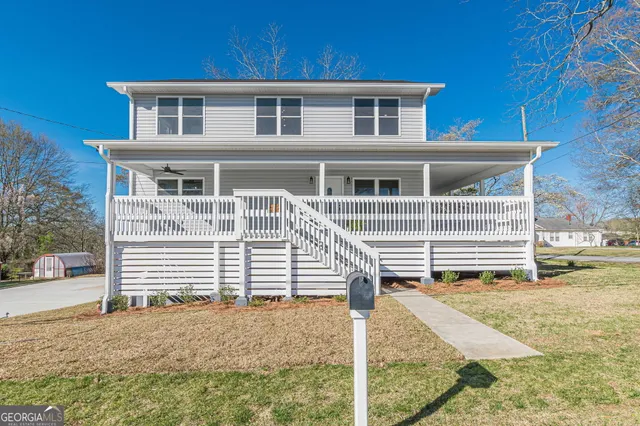 a view of a house with swimming pool