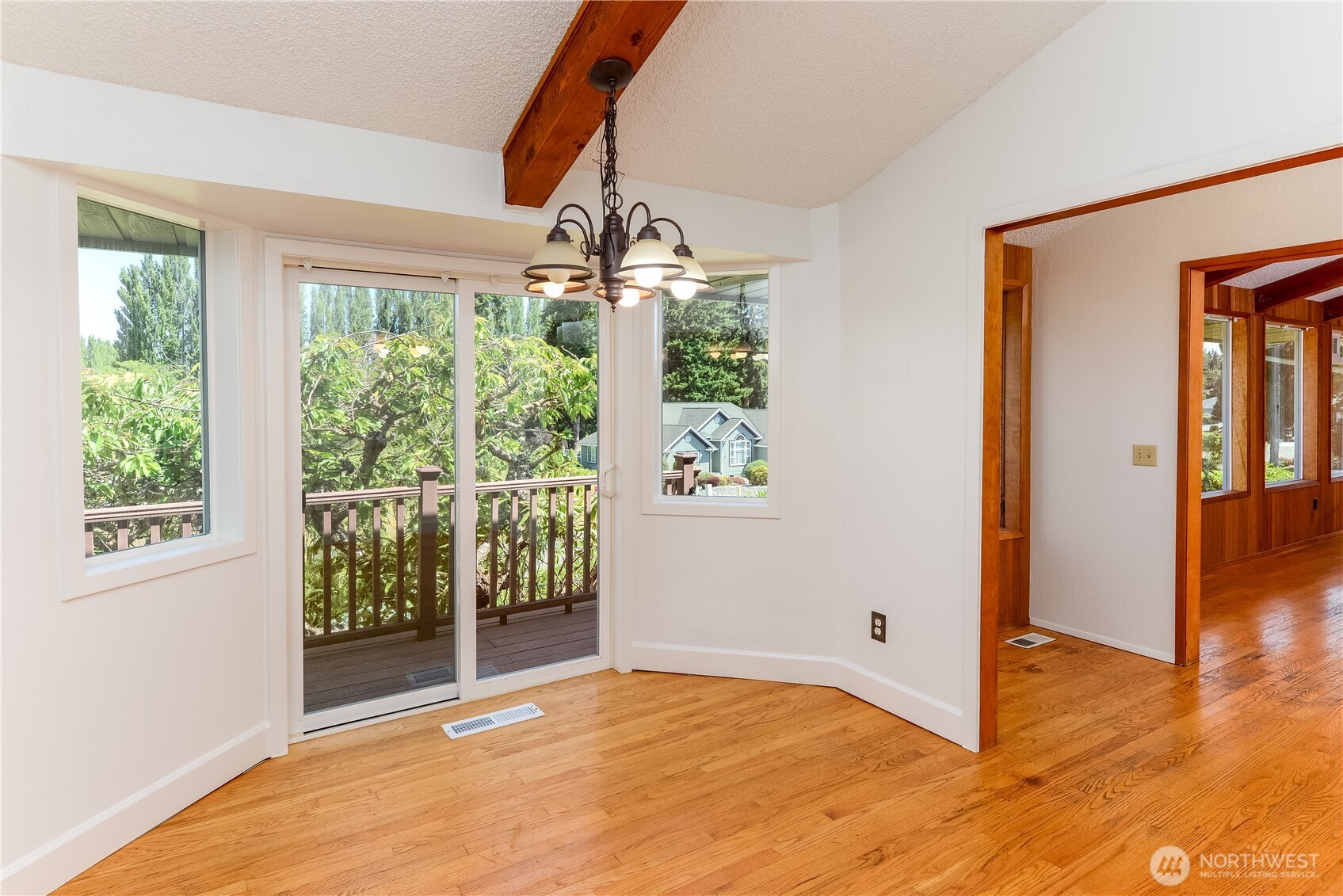 179 Hurricane Ridge Drive Sequim, WA 98382 - Photo 18 of 34 a view of empty room with wooden floor and fan
