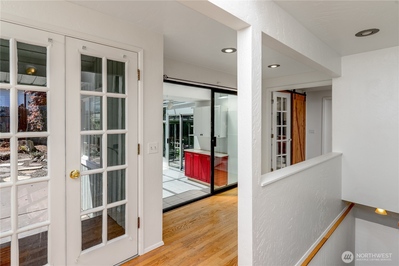 179 Hurricane Ridge Drive Sequim, WA 98382 - Photo 20 of 34 a view of an entryway with wooden floor and door
