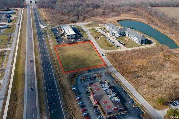 a view of a road with an outdoor space