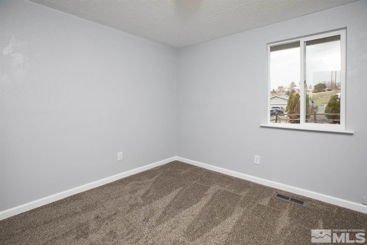 14075 Perlite Drive Reno, NV 89521 - Photo 16 of 25 an empty room with a window