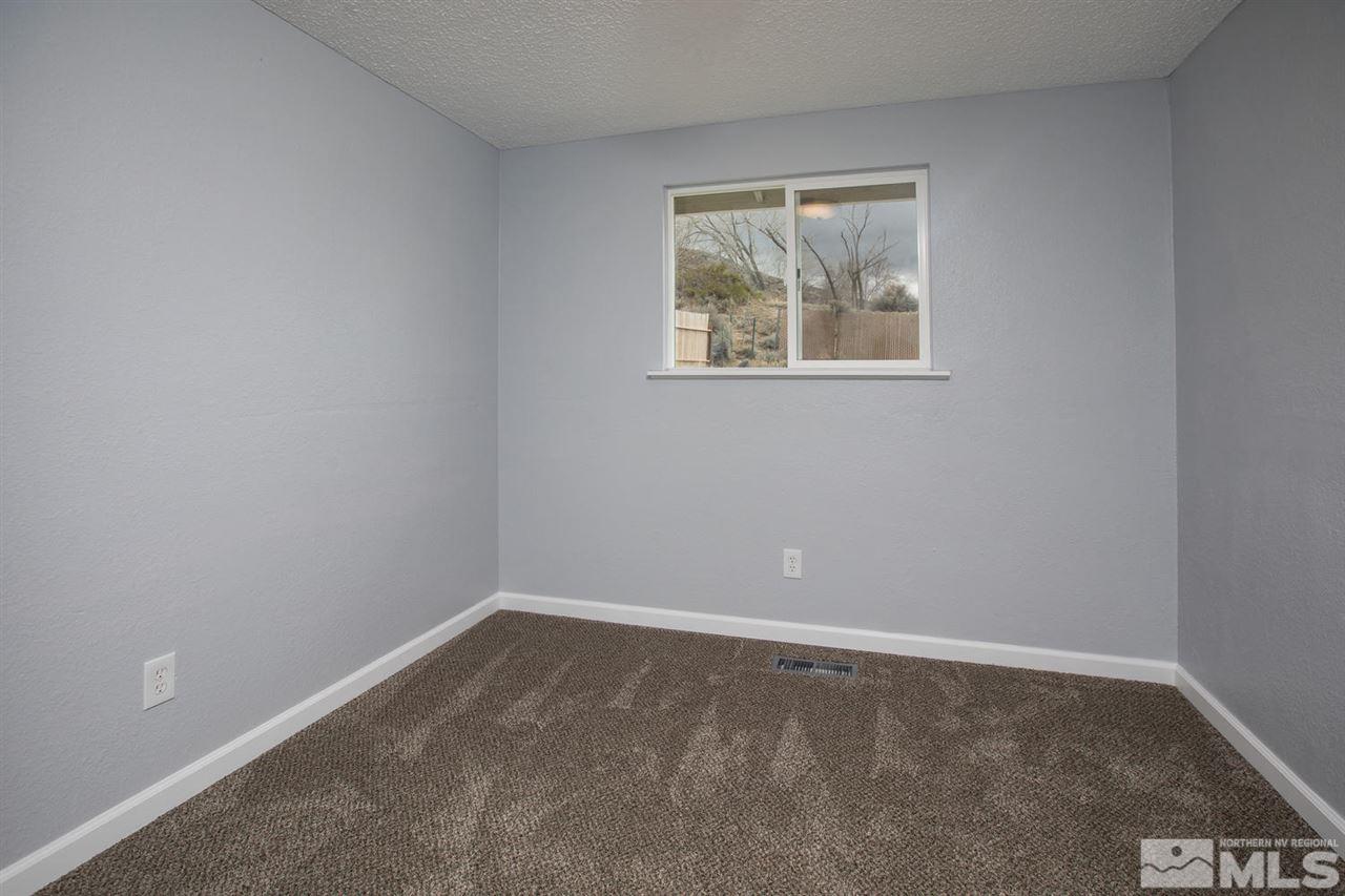 14075 Perlite Drive Reno, NV 89521 - Photo 17 of 25 an empty room with a window