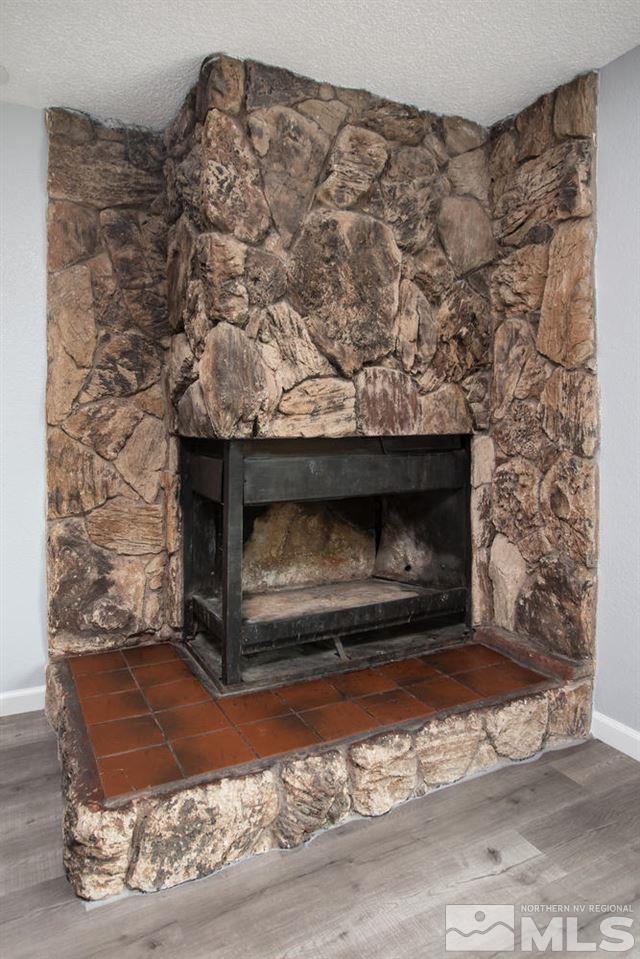 14075 Perlite Drive Reno, NV 89521 - Photo 4 of 25 a living room with a fireplace