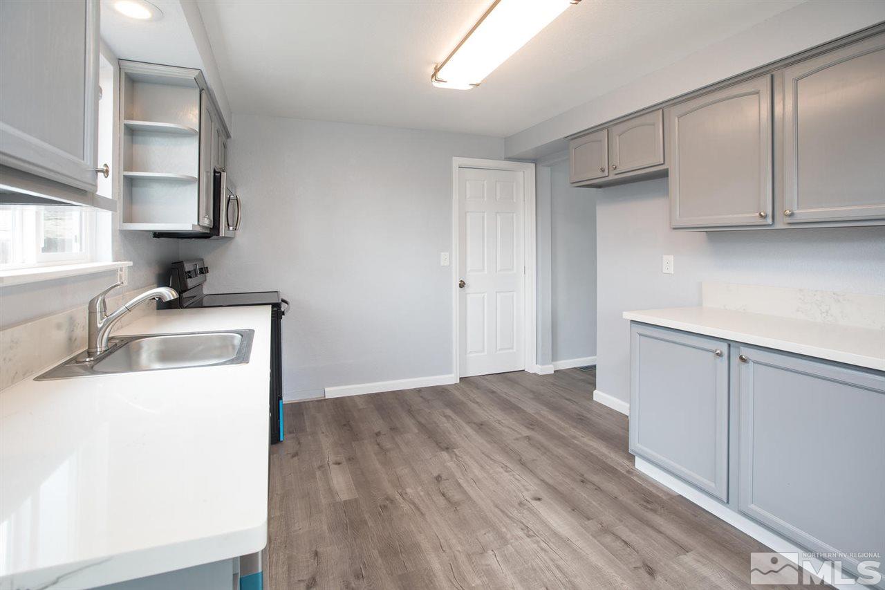 14075 Perlite Drive Reno, NV 89521 - Photo 8 of 25 a room with storage and utility