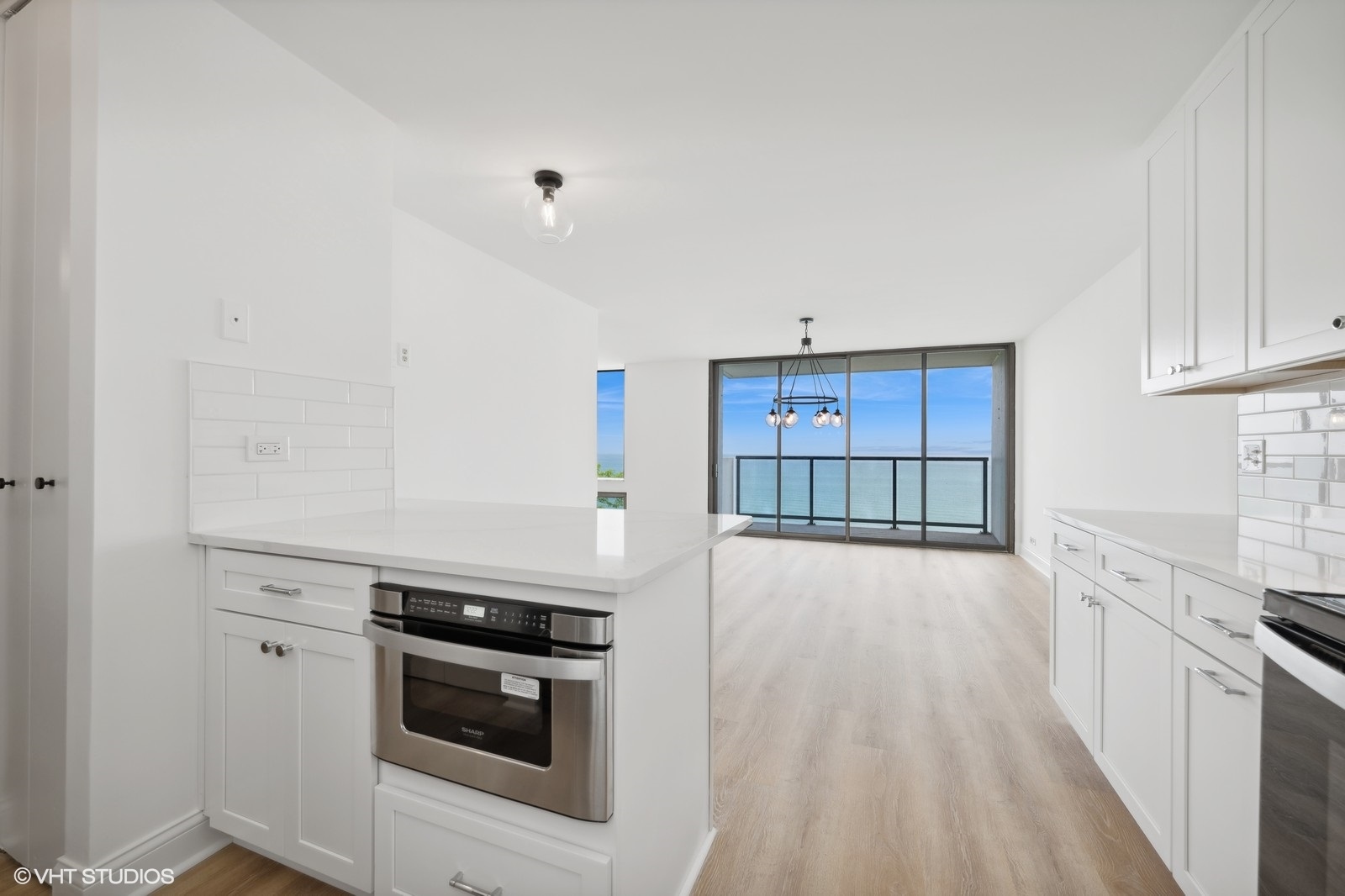 1500 Sheridan Road, Unit 4J Wilmette, IL 60091 - Photo 10 of 24 a kitchen with stainless steel appliances granite countertop a stove and a sink