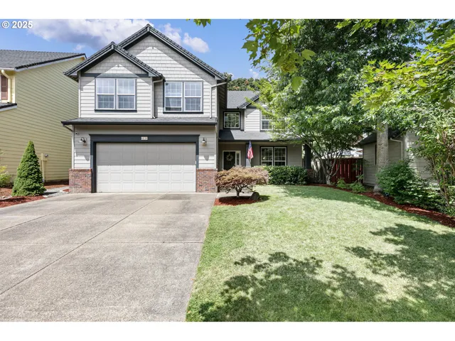 a house view with a garden space