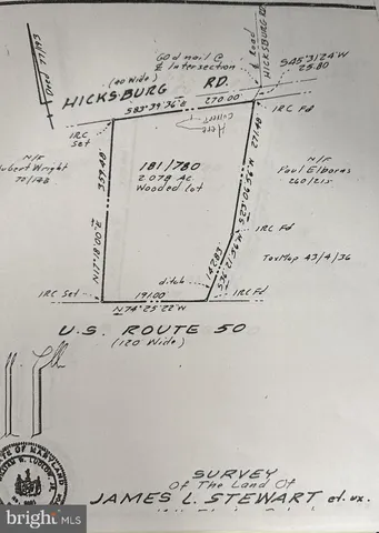 a view of a road with a yard