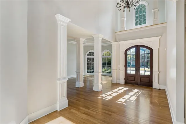 a view of entryway with wooden floor