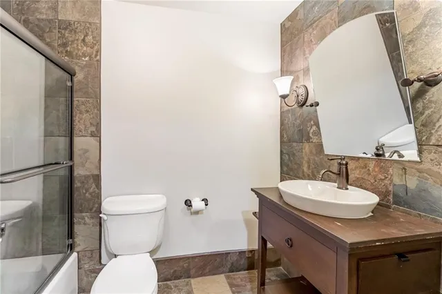 a view of road with large trees