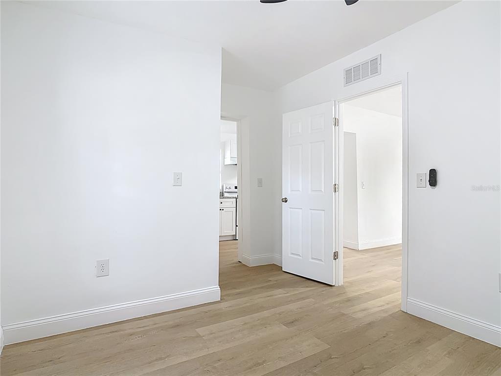 2410 SW Road Sanford, FL 32771 - Photo 17 of 30 an empty room with wooden floor