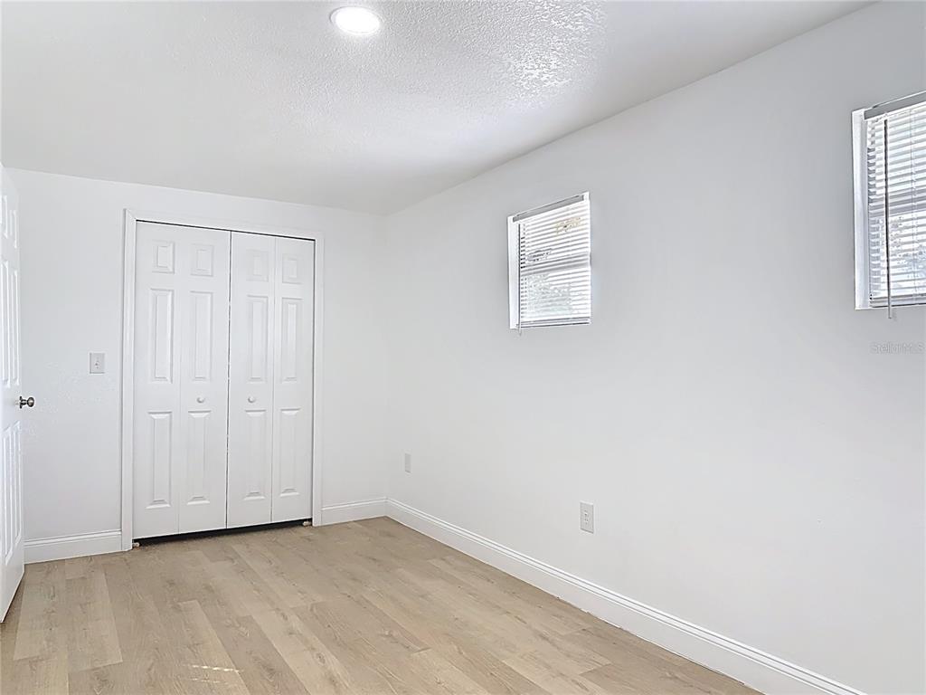 2410 SW Road Sanford, FL 32771 - Photo 25 of 30 an empty room with windows