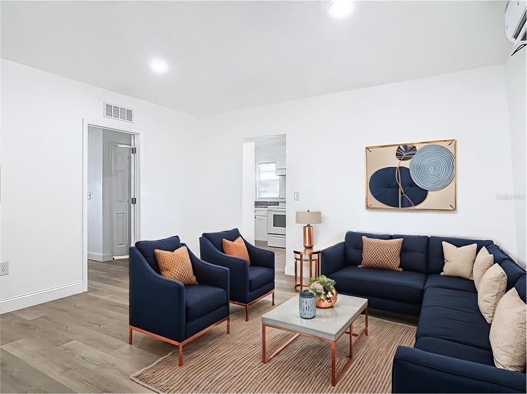 2410 SW Road Sanford, FL 32771 - Photo 8 of 30 a living room with furniture and wooden floor