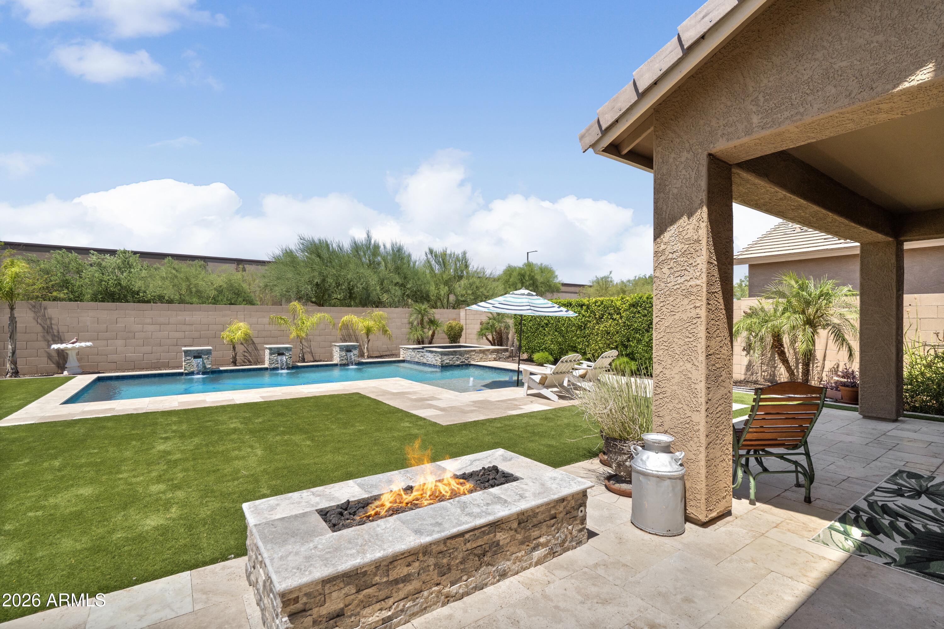 4120 East Roy Rogers Road Cave Creek, AZ 85331 - Photo 11 of 35 Firepit off the covered patio