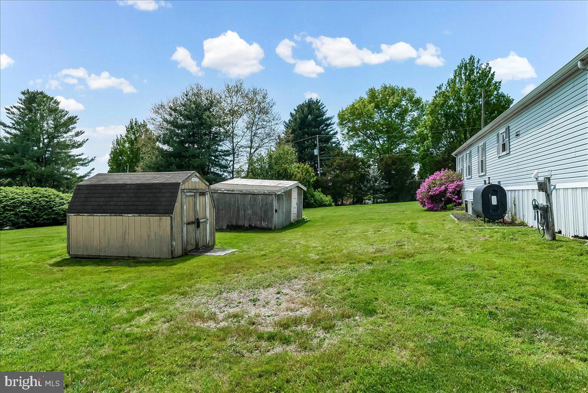 131 Cedarcroft Road Kennett Square, PA 19348 - Photo 26 of 28 Spacious yard with charming sheds.