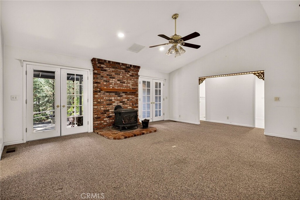 10202 Cohasset Road Chico, CA 95973 - Photo 12 of 71 a view of an empty room with a fireplace
