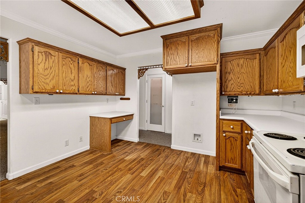 10202 Cohasset Road Chico, CA 95973 - Photo 21 of 71 a kitchen with a refrigerator stove and sink