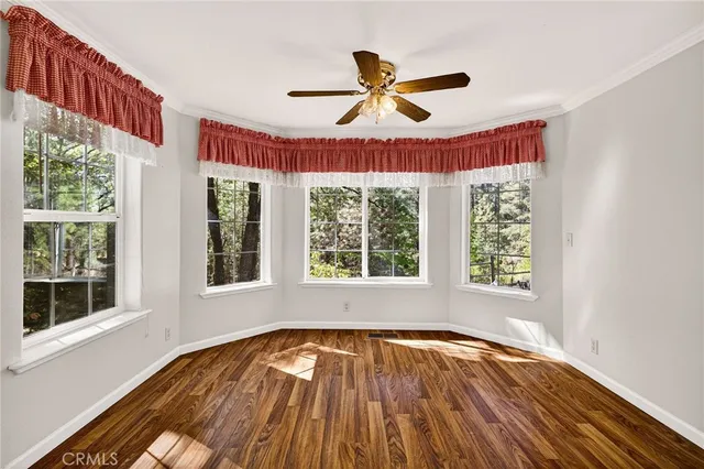 a bathroom with a double vanity sink mirror and bathtub
