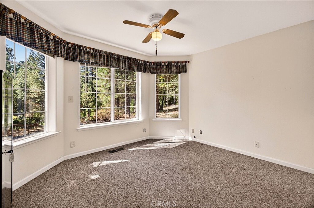 10202 Cohasset Road Chico, CA 95973 - Photo 31 of 71 a view of an empty room with a window