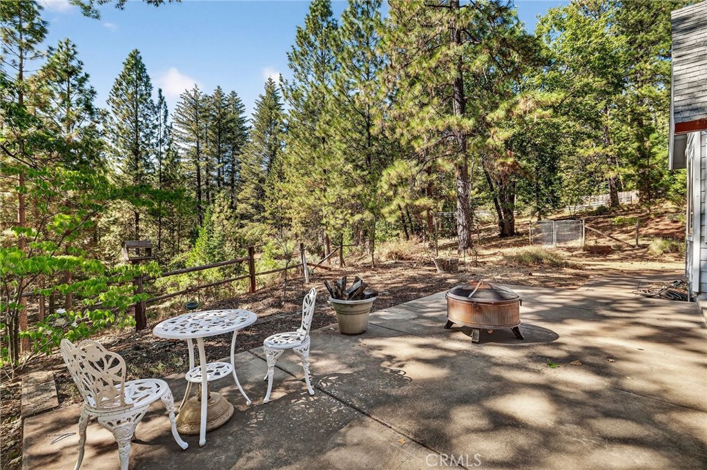 10202 Cohasset Road Chico, CA 95973 - Photo 51 of 71 a backyard of a house with table and chairs