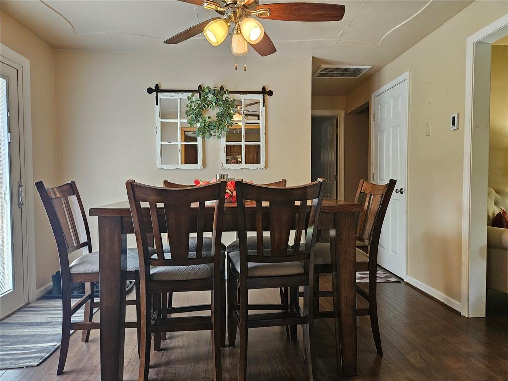 1018 Chicora Road Chicora, PA 16025 - Photo 14 of 43 a view of a dining room with furniture and wooden floor