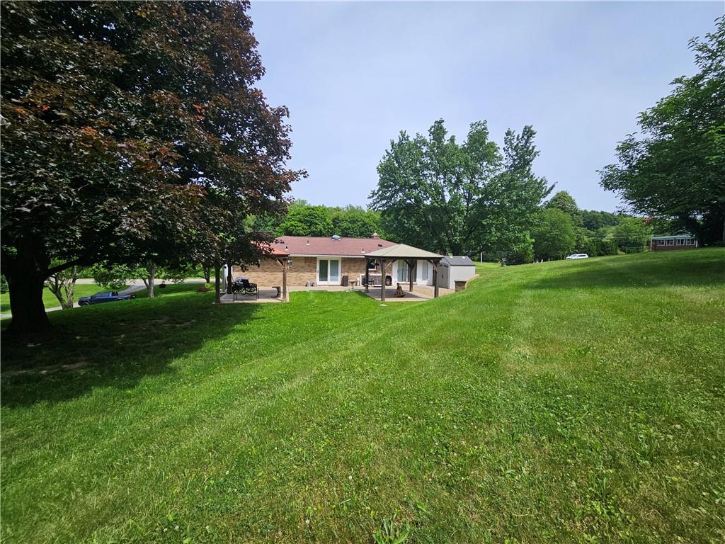 1018 Chicora Road Chicora, PA 16025 - Photo 2 of 43 a view of a house with a yard and sitting area