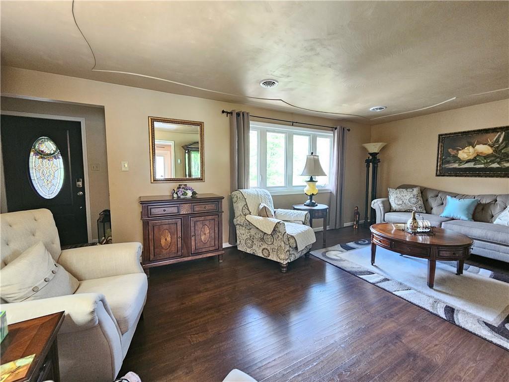 1018 Chicora Road Chicora, PA 16025 - Photo 21 of 43 a living room with furniture and a wooden floor