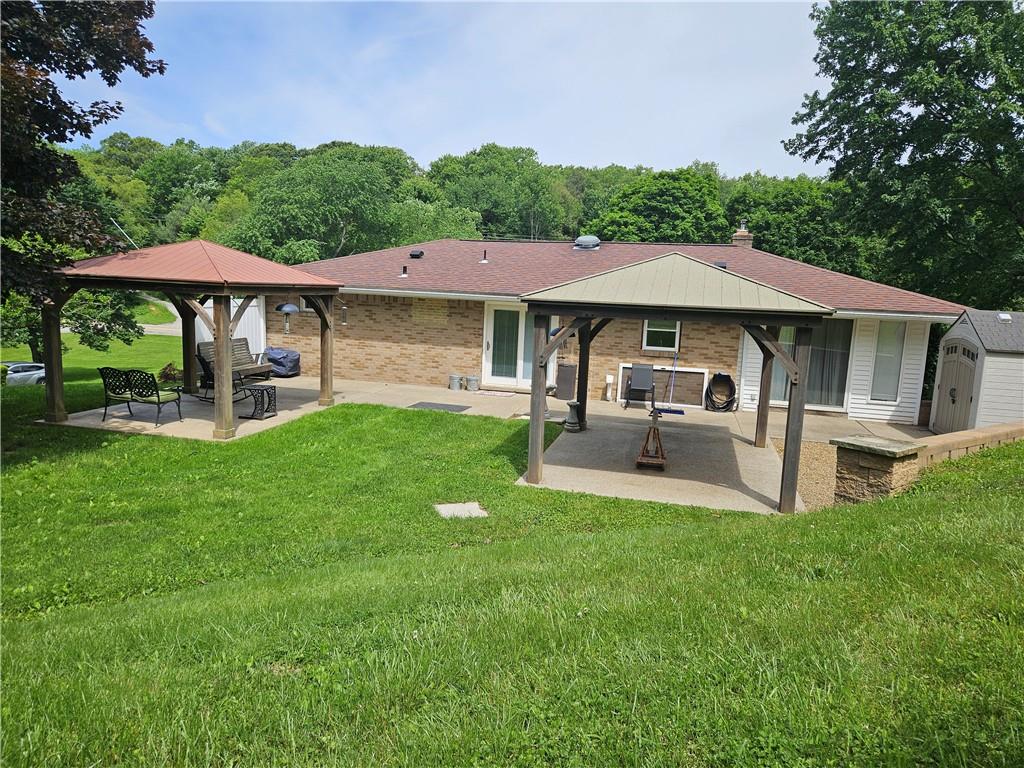 1018 Chicora Road Chicora, PA 16025 - Photo 25 of 43 a view of a house with a yard porch and sitting area
