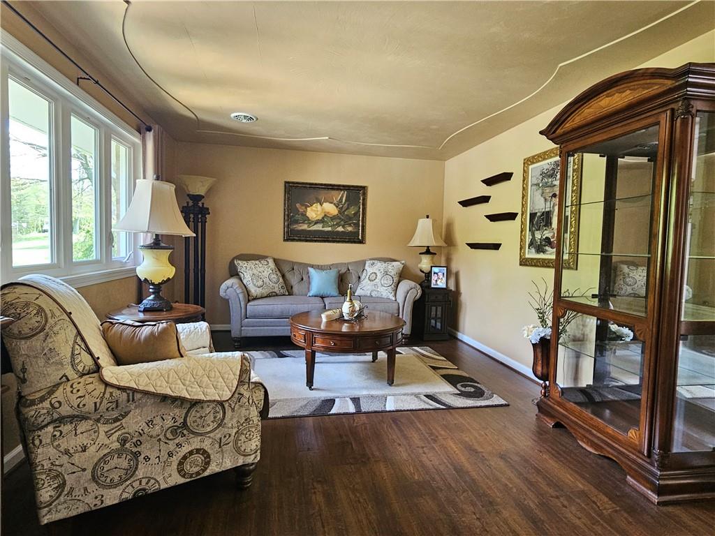 1018 Chicora Road Chicora, PA 16025 - Photo 3 of 43 a living room with furniture hard wood floor and a window
