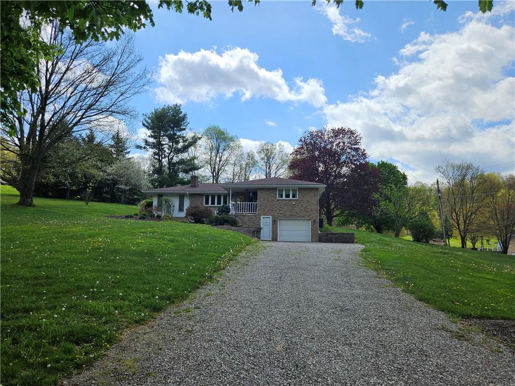 1018 Chicora Road Chicora, PA 16025 - Photo 40 of 43 a view of a house with garden