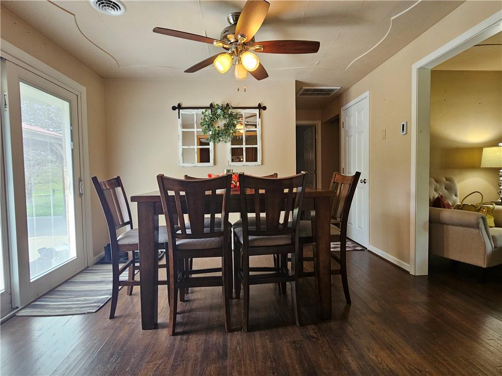 1018 Chicora Road Chicora, PA 16025 - Photo 5 of 43 a view of a dining room with furniture window and wooden floor