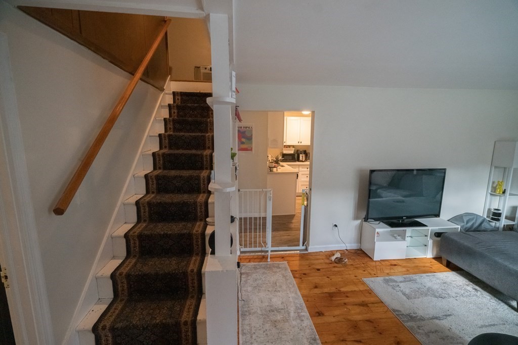 370 Pelham Road Amherst, MA 01002 - Photo 11 of 13 a view of a livingroom with furniture and staircase