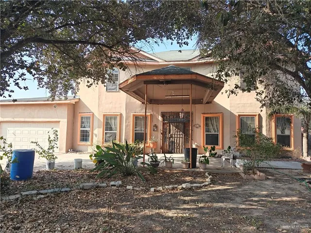 a front view of a house with a porch