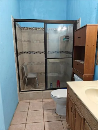 a view of a elevator with wooden floor