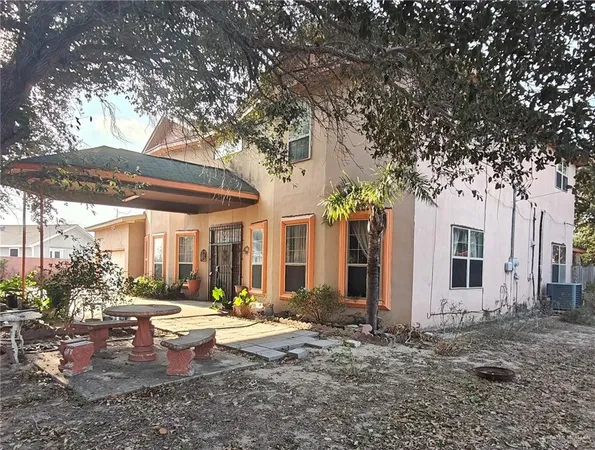 a view of a building with a sitting area