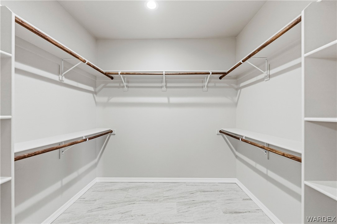 9818 North Cyrus Road Kingman, AZ 86401 - Photo 21 of 42 a view of an empty walk in closet