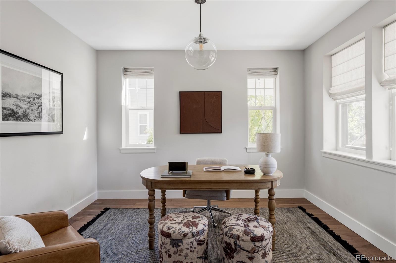 2908 Ironton Street Denver, CO 80238 - Photo 11 of 30 a living room with furniture and a window