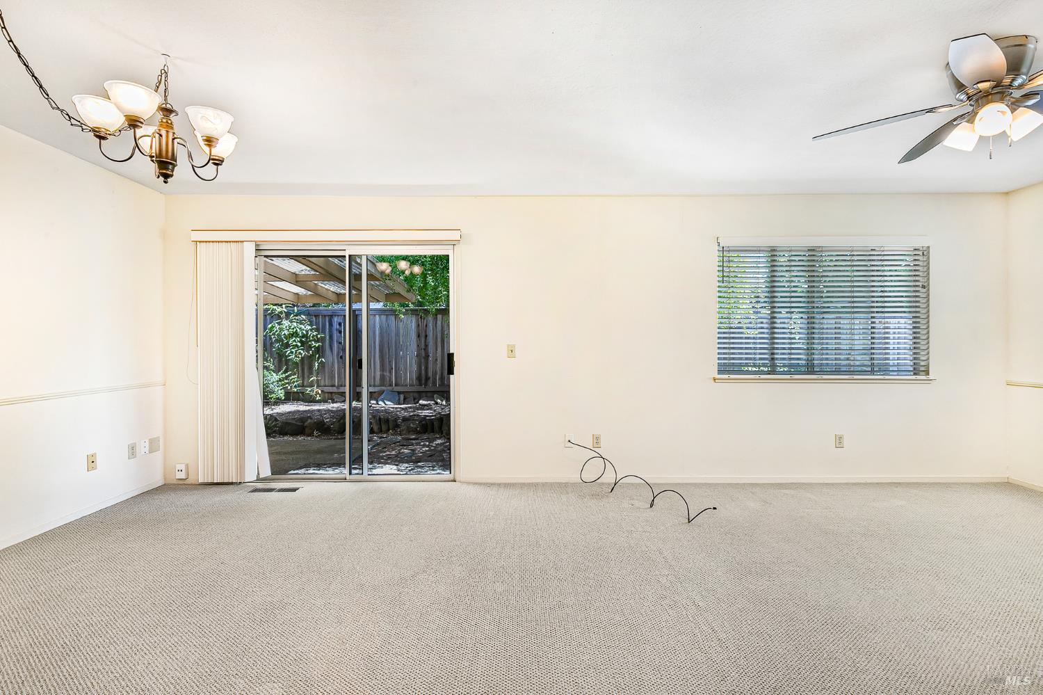 138 Oak Shadow Drive Santa Rosa, CA 95409 - Photo 21 of 50 an empty room with chandelier fan