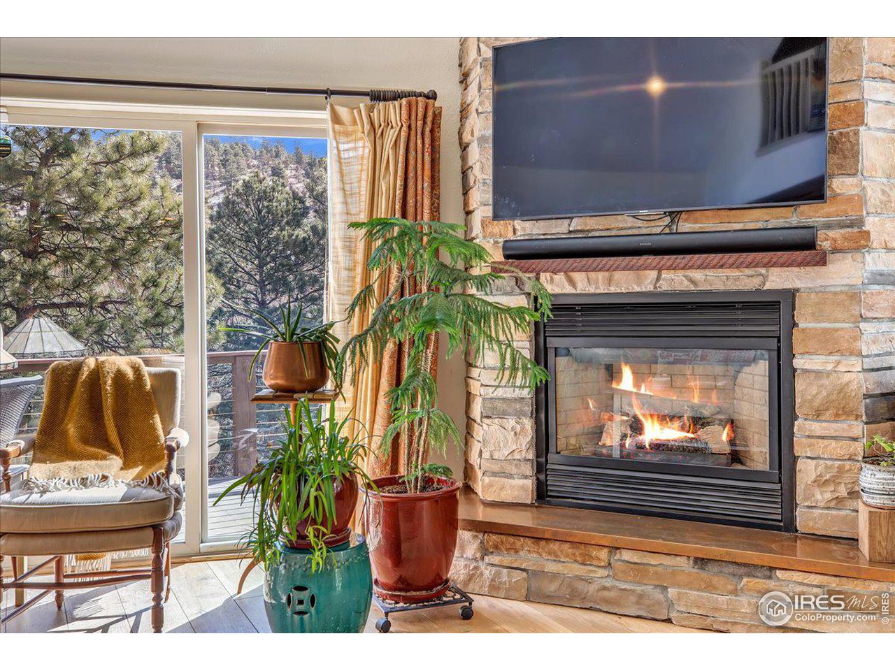 745 Sugarloaf Road Boulder, CO 80302 - Photo 3 of 37 Gas fireplace.