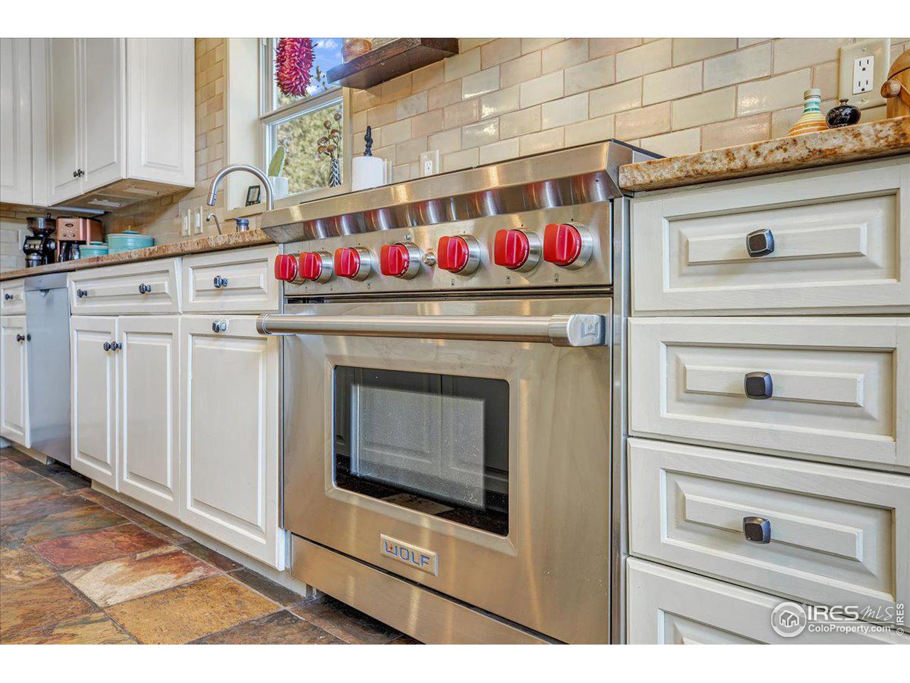 745 Sugarloaf Road Boulder, CO 80302 - Photo 6 of 37 Wolf gas range with six burners.